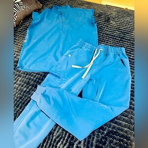 FIGS scrubs, Rafaella top and 2 pair of pants, Zamora joggers and uman joggers.